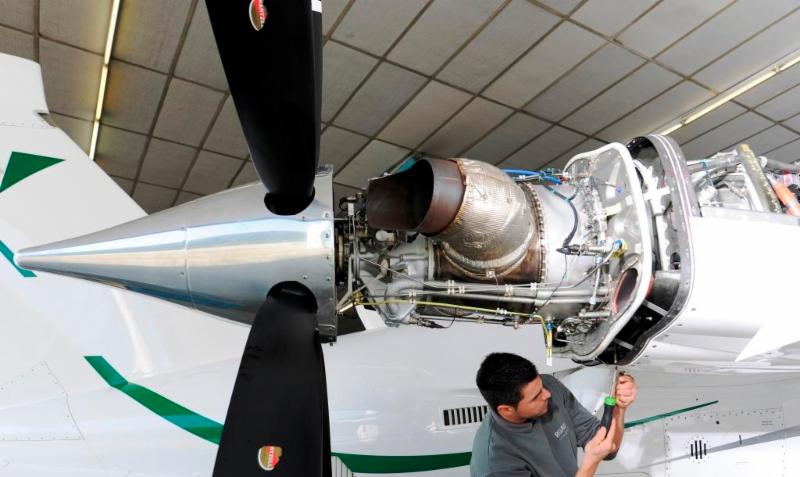 RUAG Aviation maintenance technician works on Piaggio P-180